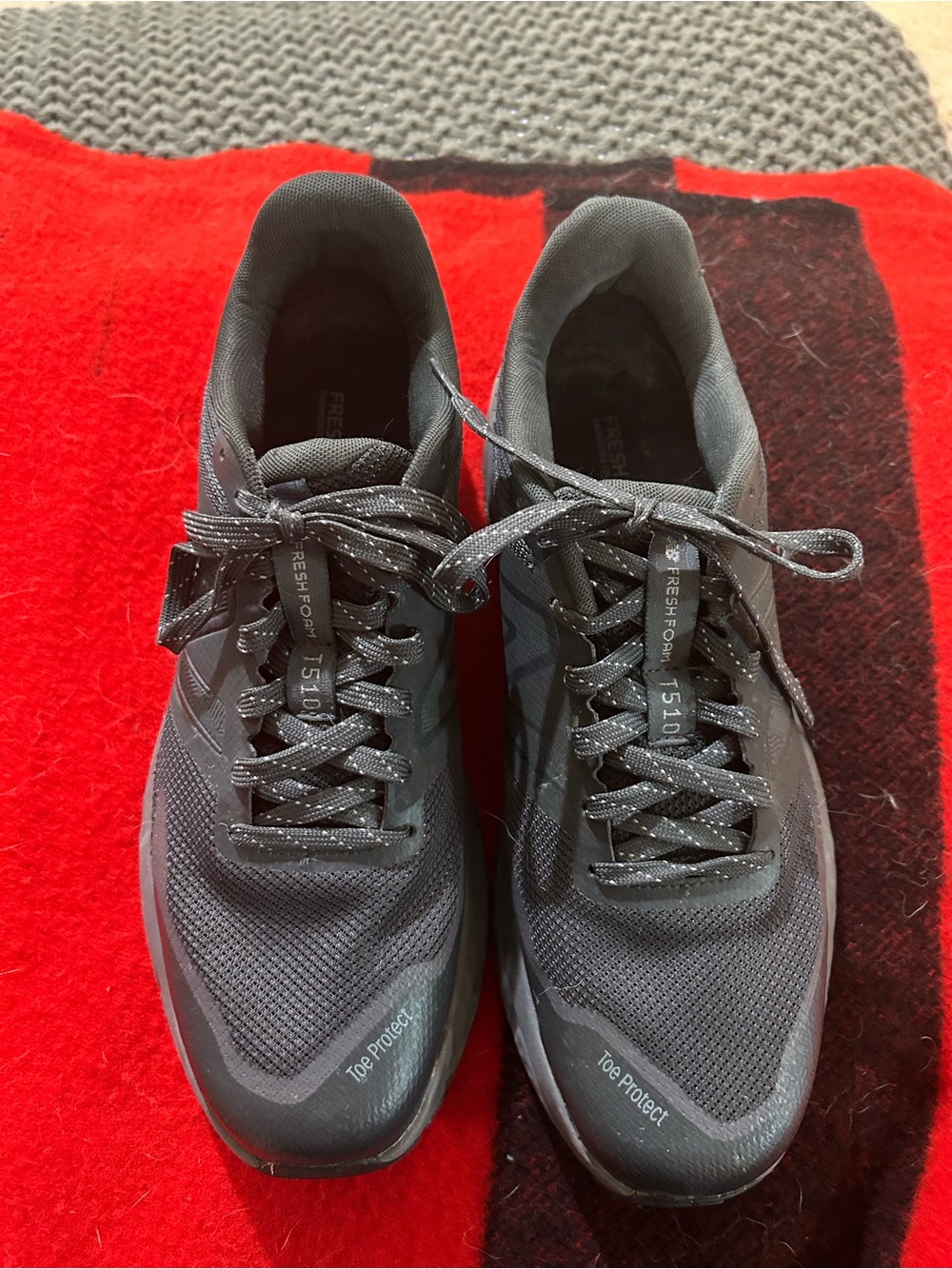 New Balance Men's Black Athletic Sneakers with Reflective Accents